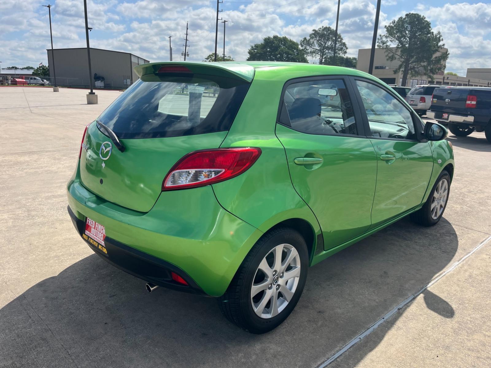 2013 green /black Mazda MAZDA2 Touring (JM1DE1LY1D0) with an 1.5L L4 DOHC 16V engine, Automatic transmission, located at 14700 Tomball Parkway 249, Houston, TX, 77086, (281) 444-2200, 29.928619, -95.504074 - Photo #6